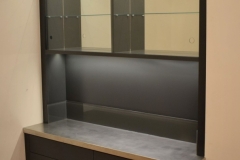 Drinks cabinet with glass doors and shelves mirror back, zinc top and lacquered glass splash back